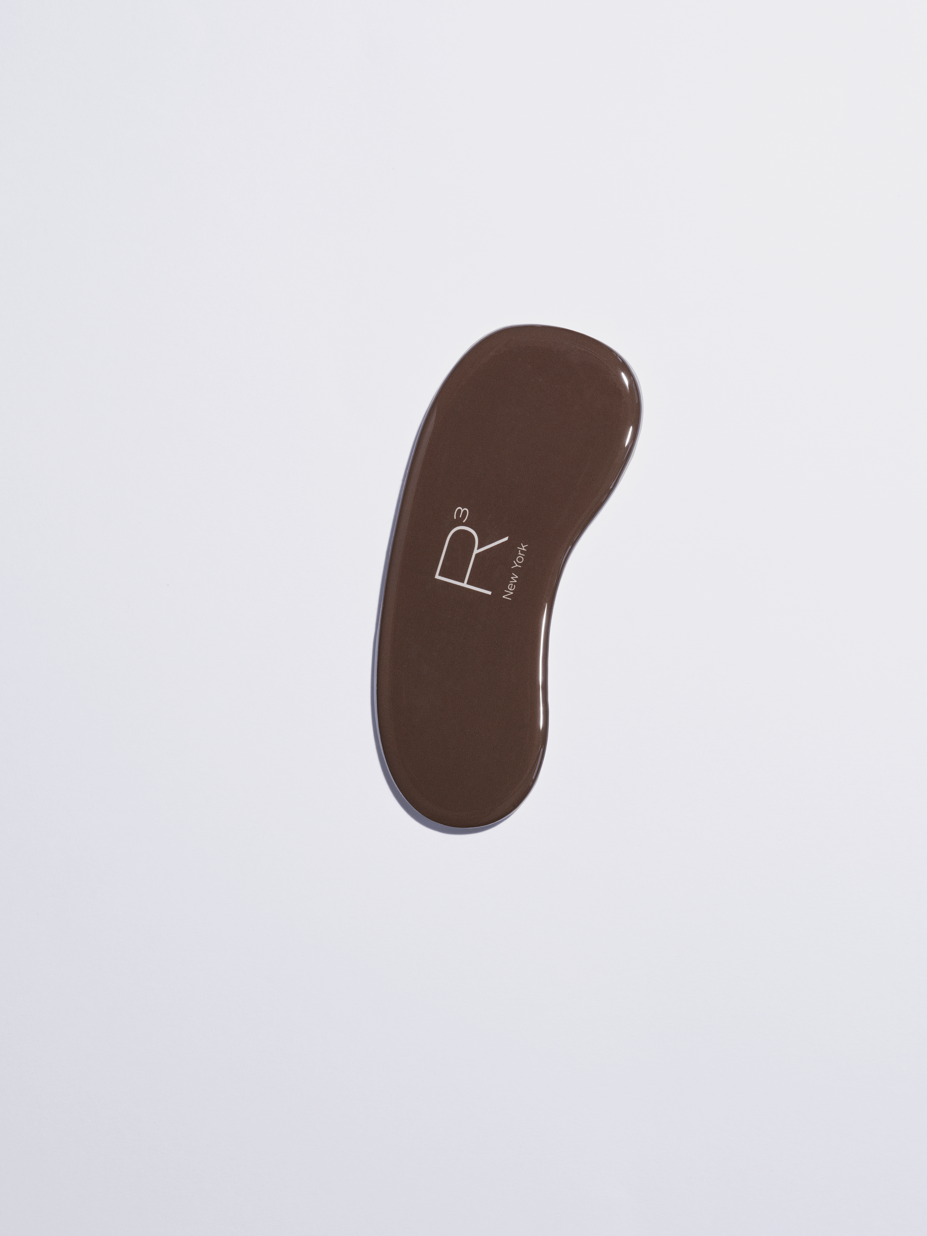 RCUBED Japanese glass foot file designed to gently smooth calluses and reveal healthy, soft skin.