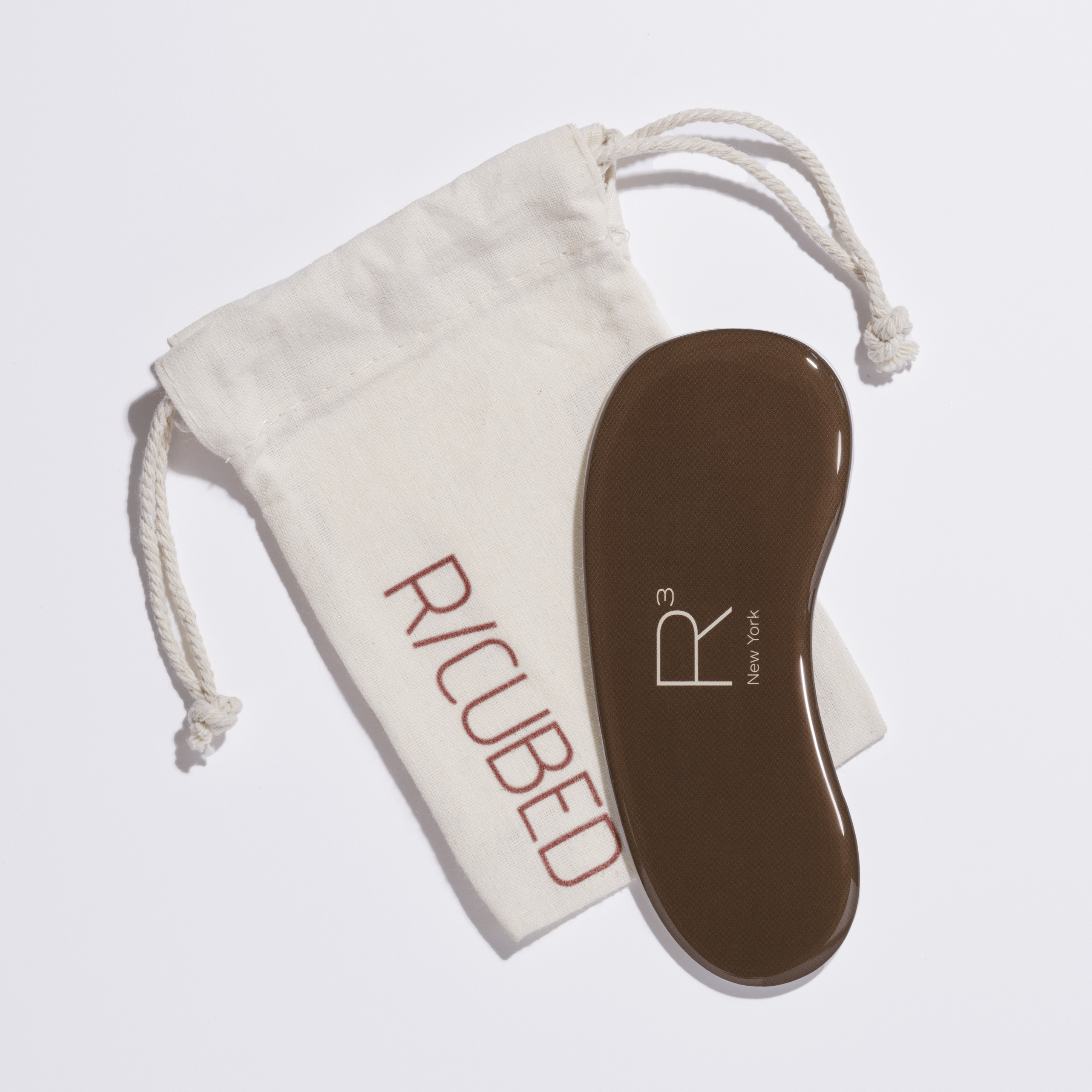 RCUBED Japanese glass foot file designed to gently smooth calluses and reveal healthy, soft skin.