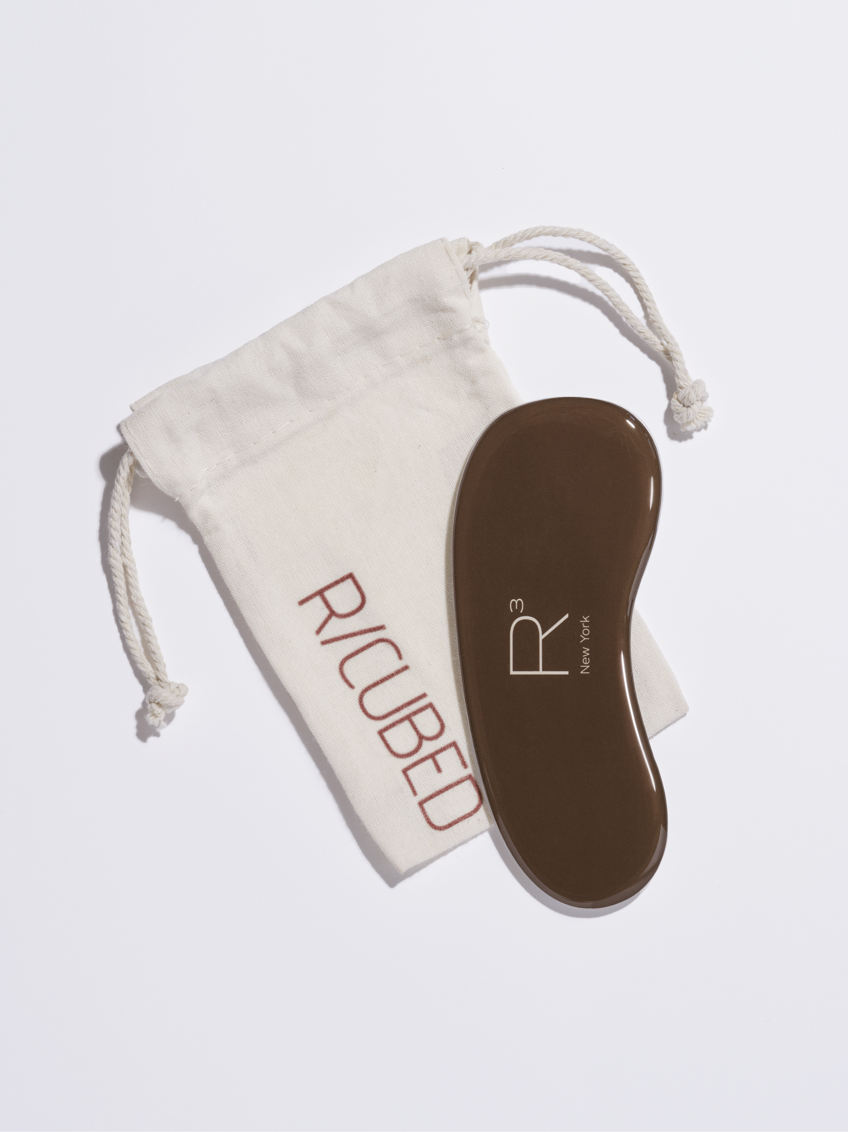 RCUBED Japanese glass foot file designed to gently smooth calluses and reveal healthy, soft skin.